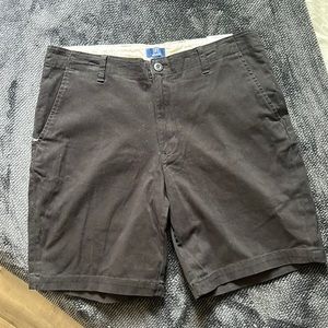 Black George shorts “above the knee”. Size 32